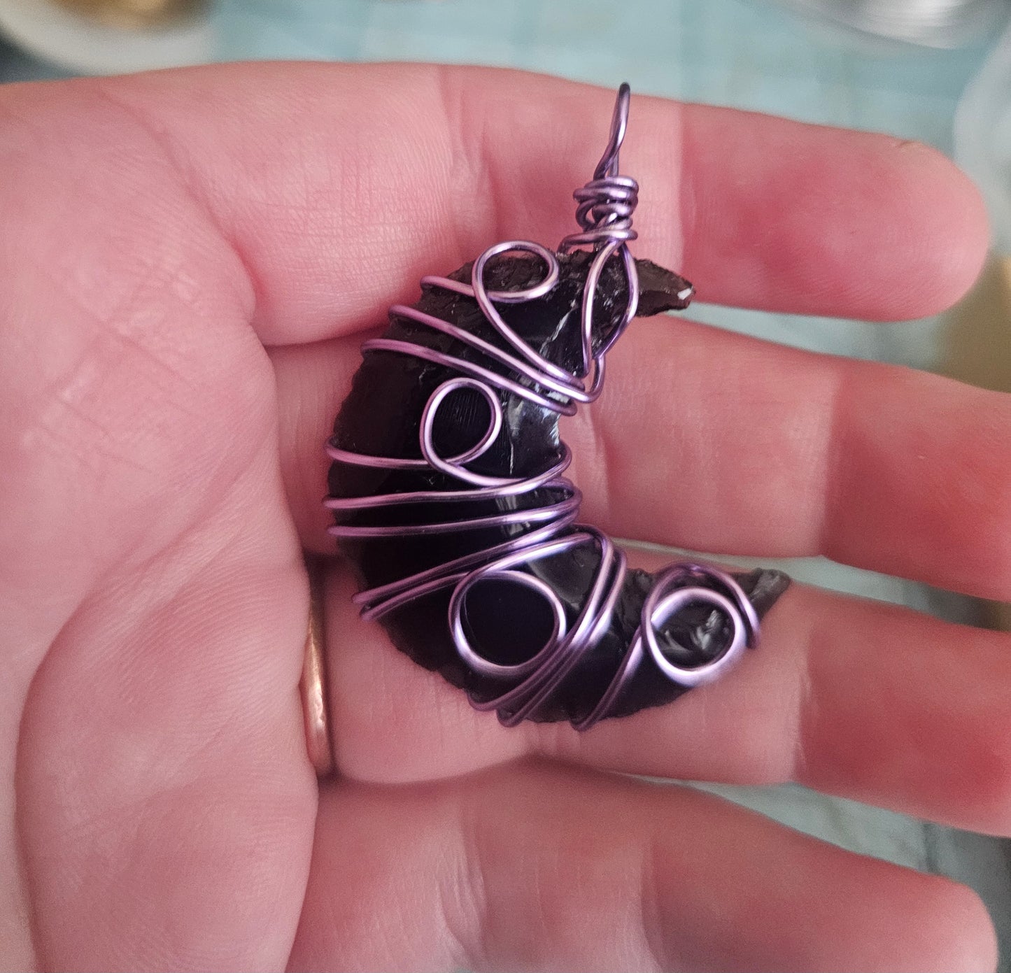 Obsidian Moon wrapped in purple